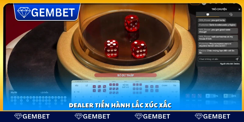 Dealer thực hiện việc lắc xúc xắc